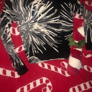 Like New beautiful black and white crew neck long sleeve top with bling detail